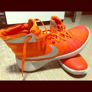 Orange Nike tennis